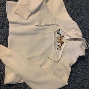 White butterfly patch crop sweater